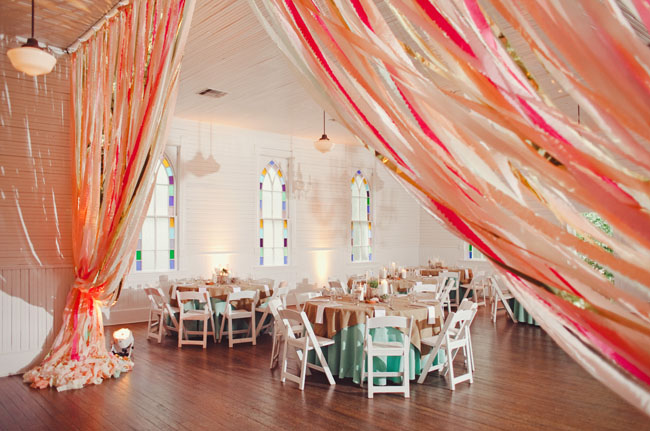 Reception Seating Inside w Coral Ribbons Draping.jpg